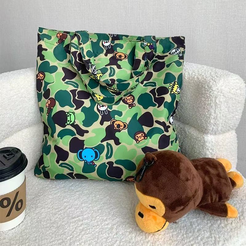 Bathing Shark and ape head print Bag Blue-green camouflage little monkey cartoon doll , storage handbag NextBlock