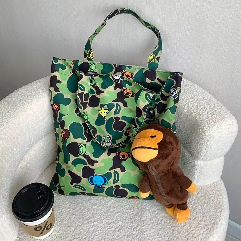 Bathing Shark and ape head print Bag Blue-green camouflage little monkey cartoon doll , storage handbag NextBlock