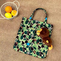 Bathing Shark and ape head print Bag Blue-green camouflage little monkey cartoon doll , storage handbag NextBlock